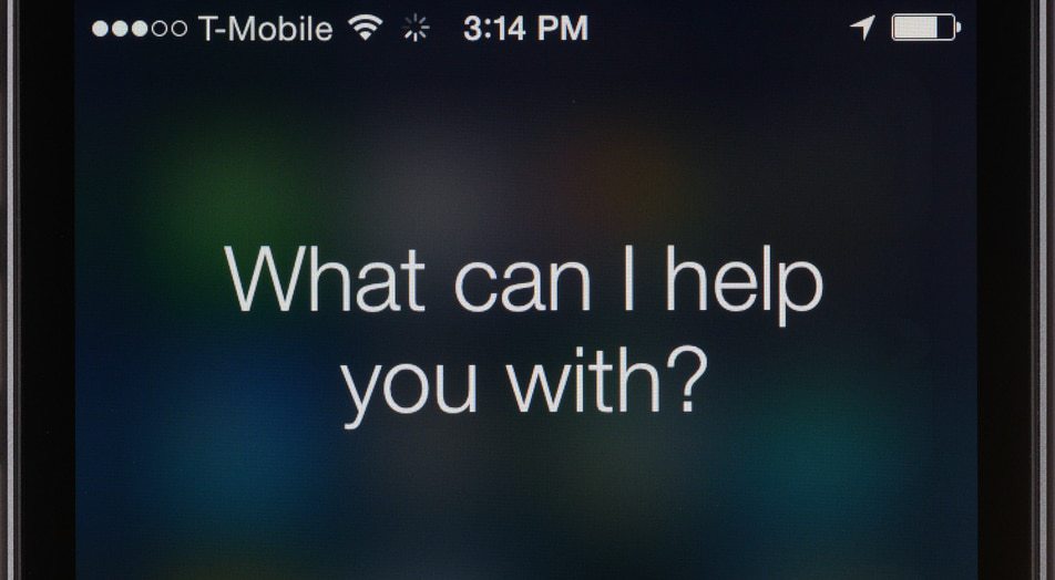 Siri running on an Apple iPhone 5s. Siri is Apple's voice recognition system for iOS. Siri can be used to make calls, send text messages, set reminders, and many other things just by using your voice.